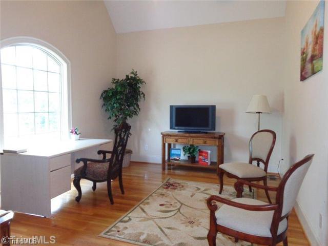 1702 Rita Court Oak Ridge, NC 27310 - Photo 4 of 16 Living Room. Formal living room is perfect office space, music room or library. Has vaulted ceiling and designer window