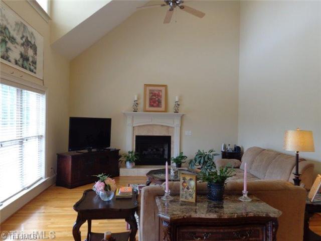 1702 Rita Court Oak Ridge, NC 27310 - Photo 9 of 16 Den/Family/Great Room. Spacious room with lots of natural light. Great for family gatherings. The vaulted ceiling and gas log fireplace just enough for the warm "glad to be home" feeling