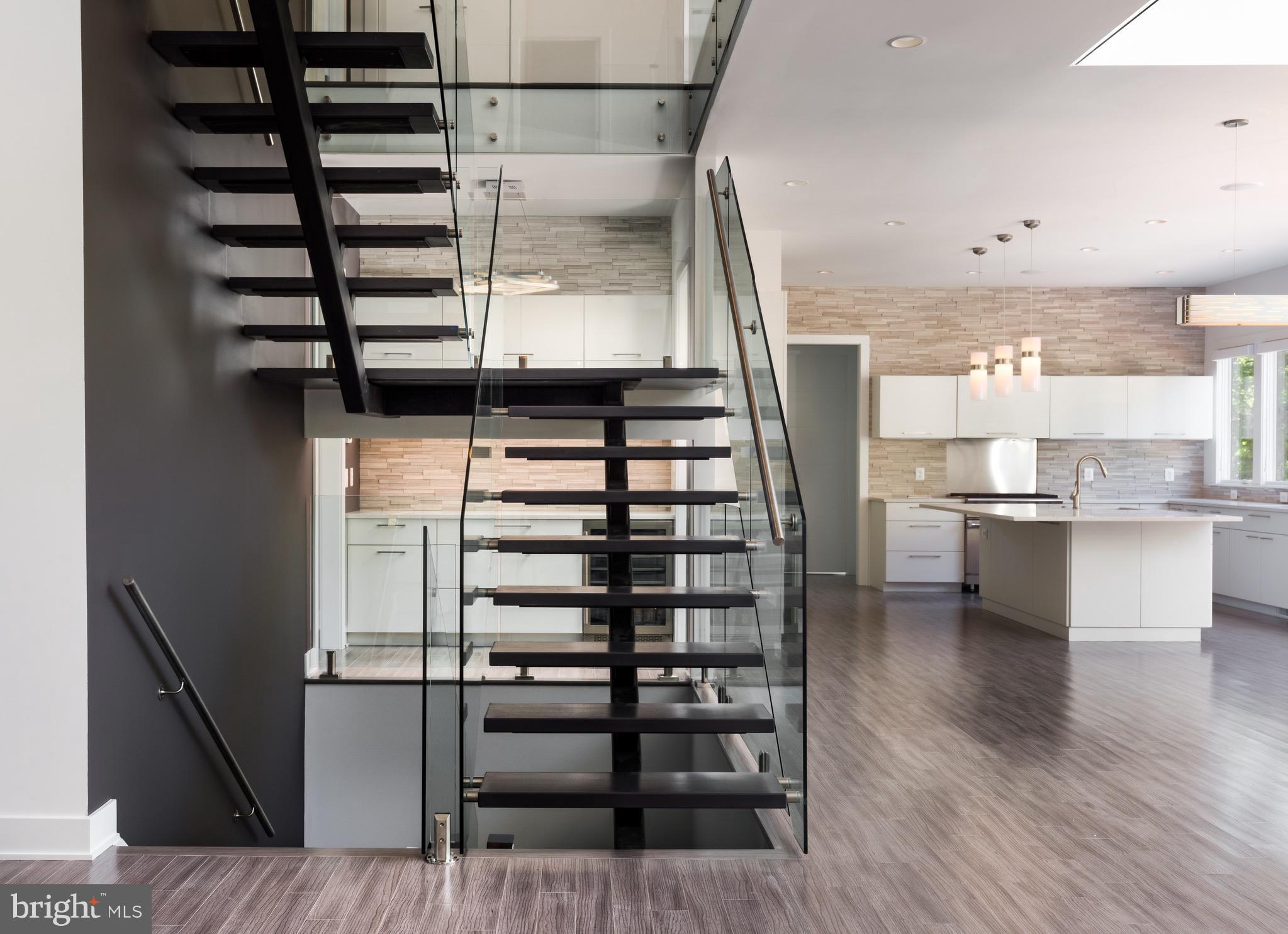 1217 Crest Lane McLean, VA 22101 - Photo 15 of 28 a view of kitchen with stainless steel appliances cabinets and wooden floor