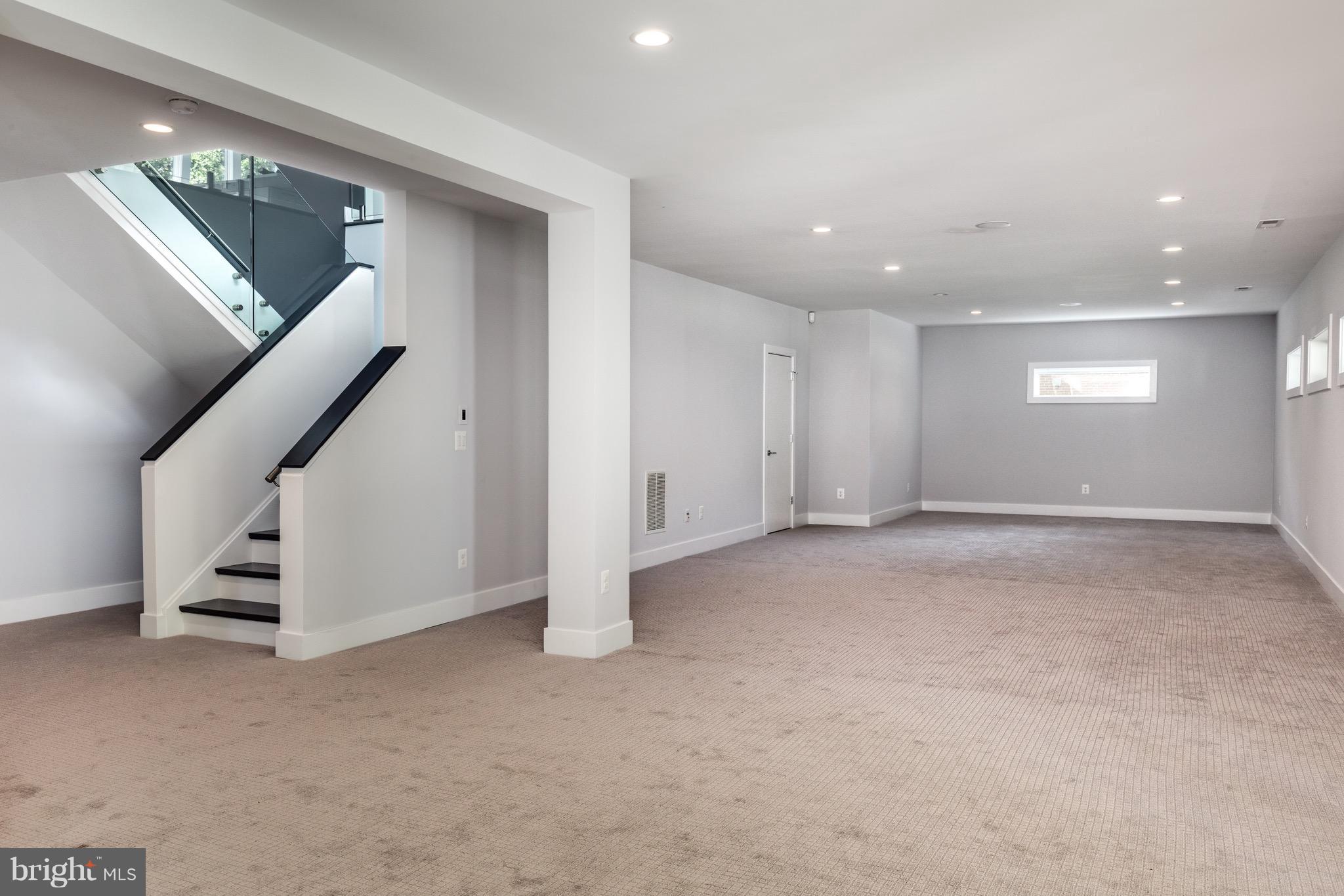 1217 Crest Lane McLean, VA 22101 - Photo 26 of 28 a view of an empty room with stairs and ventilation