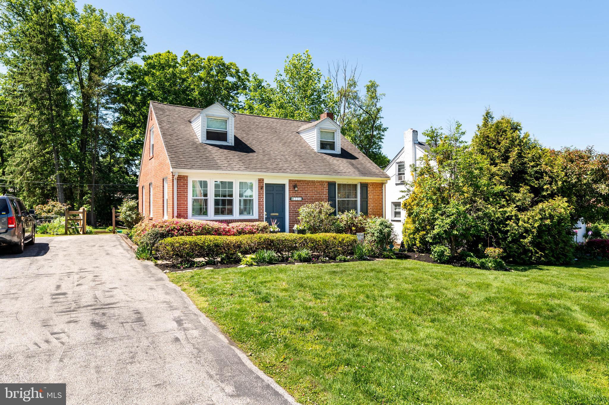 224 Wayne Avenue Springfield, PA 19064 - Photo 1 of 27 a front view of a house with a yard