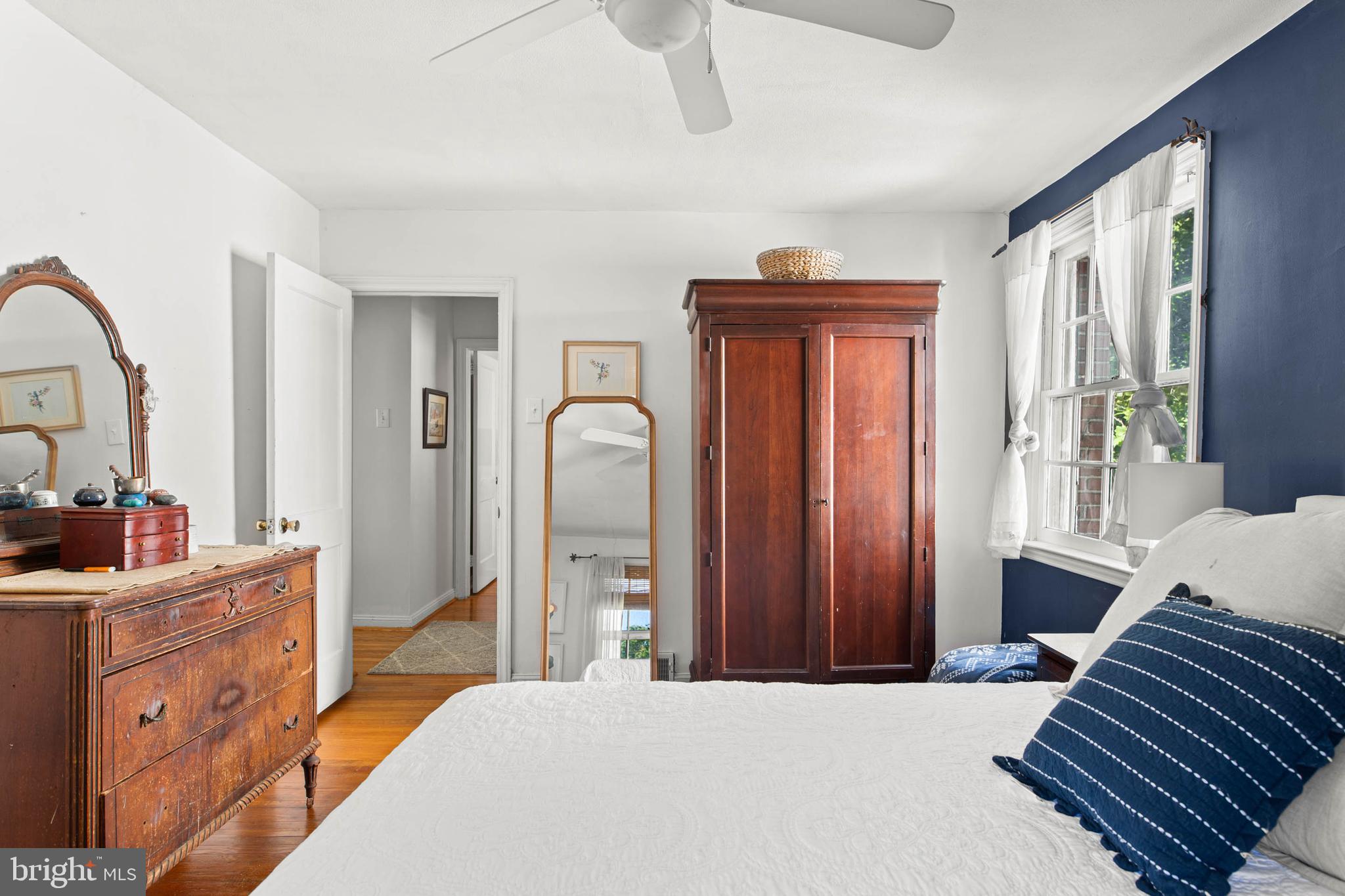 224 Wayne Avenue Springfield, PA 19064 - Photo 15 of 27 a bedroom with a bed and a dresser