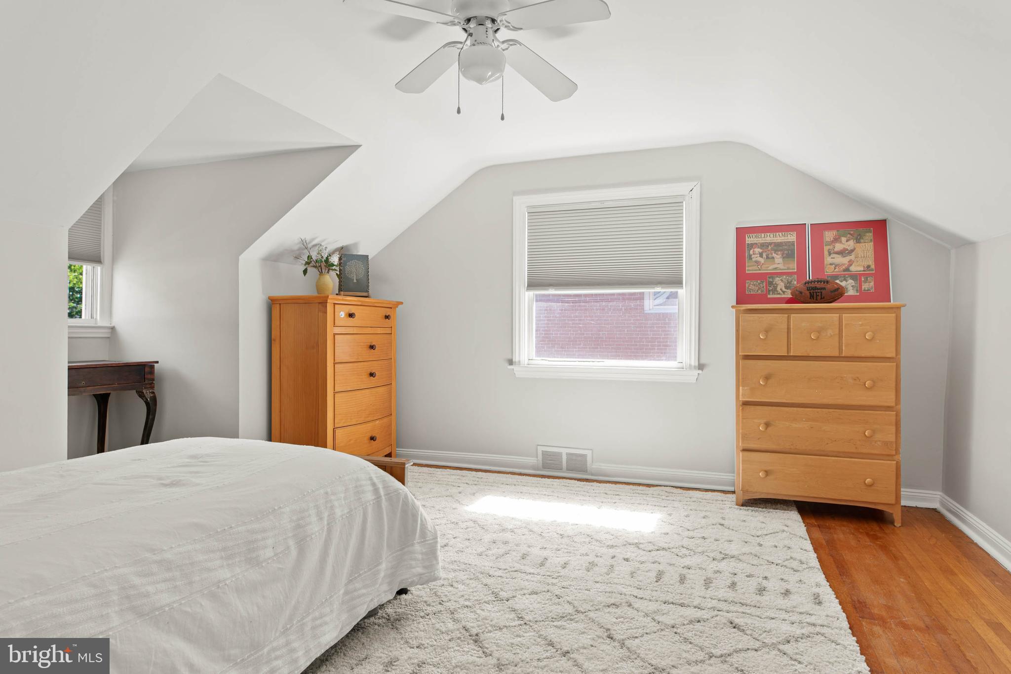 224 Wayne Avenue Springfield, PA 19064 - Photo 18 of 27 a bedroom with a bed dresser and a window