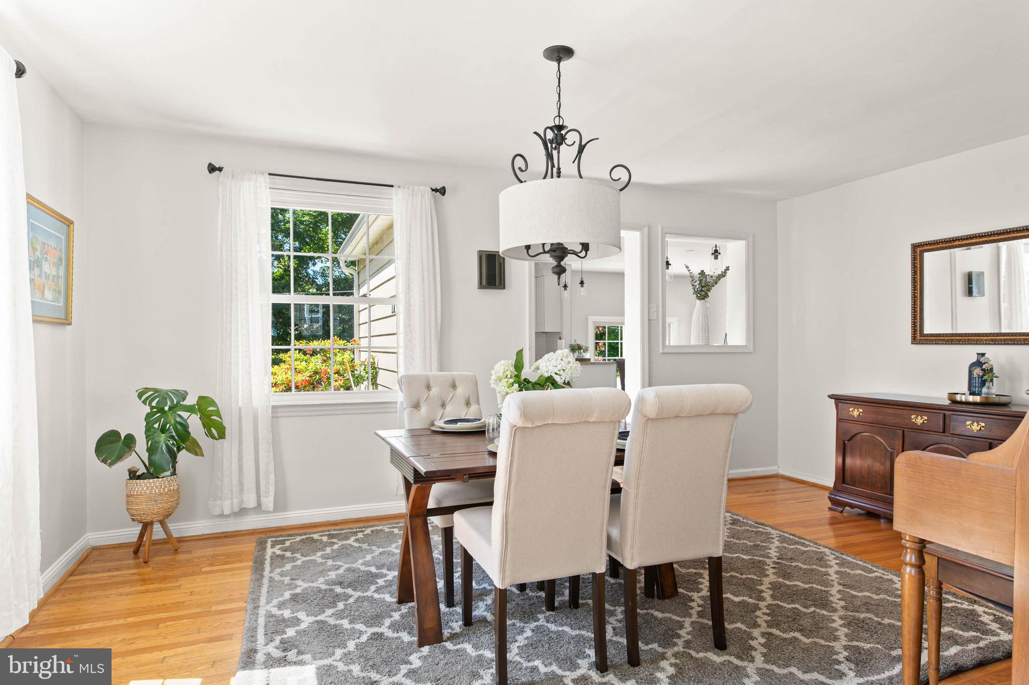 224 Wayne Avenue Springfield, PA 19064 - Photo 5 of 27 a view of a dining room with furniture window and wooden floor