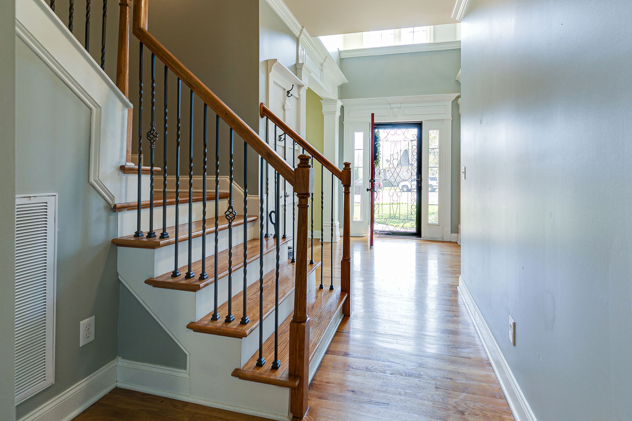 2003 Eylandt Court Spring Hill, TN 37174 - Photo 12 of 33 a view of staircase with wooden floor and white walls