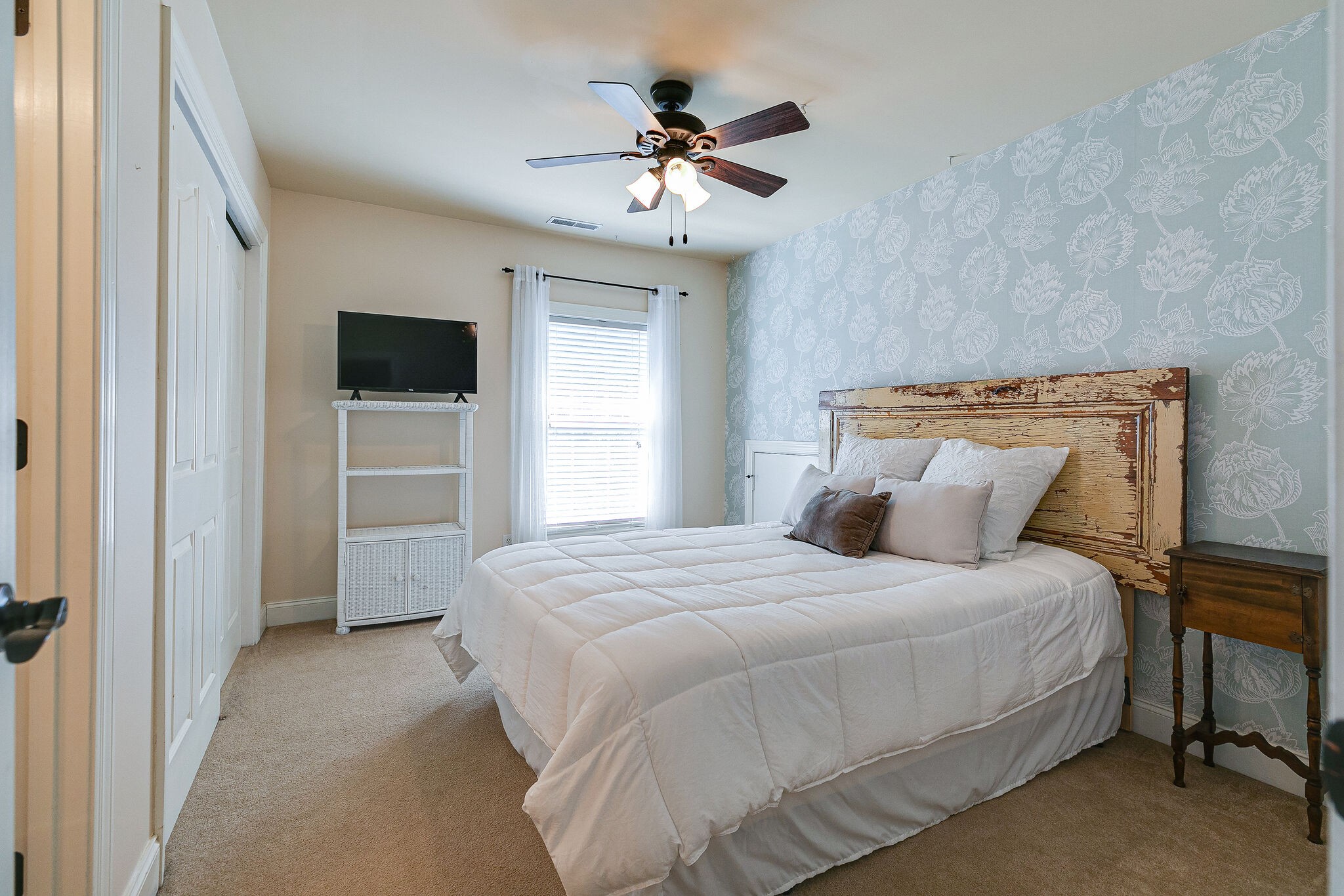 2003 Eylandt Court Spring Hill, TN 37174 - Photo 20 of 33 a bedroom with a bed and a chandelier