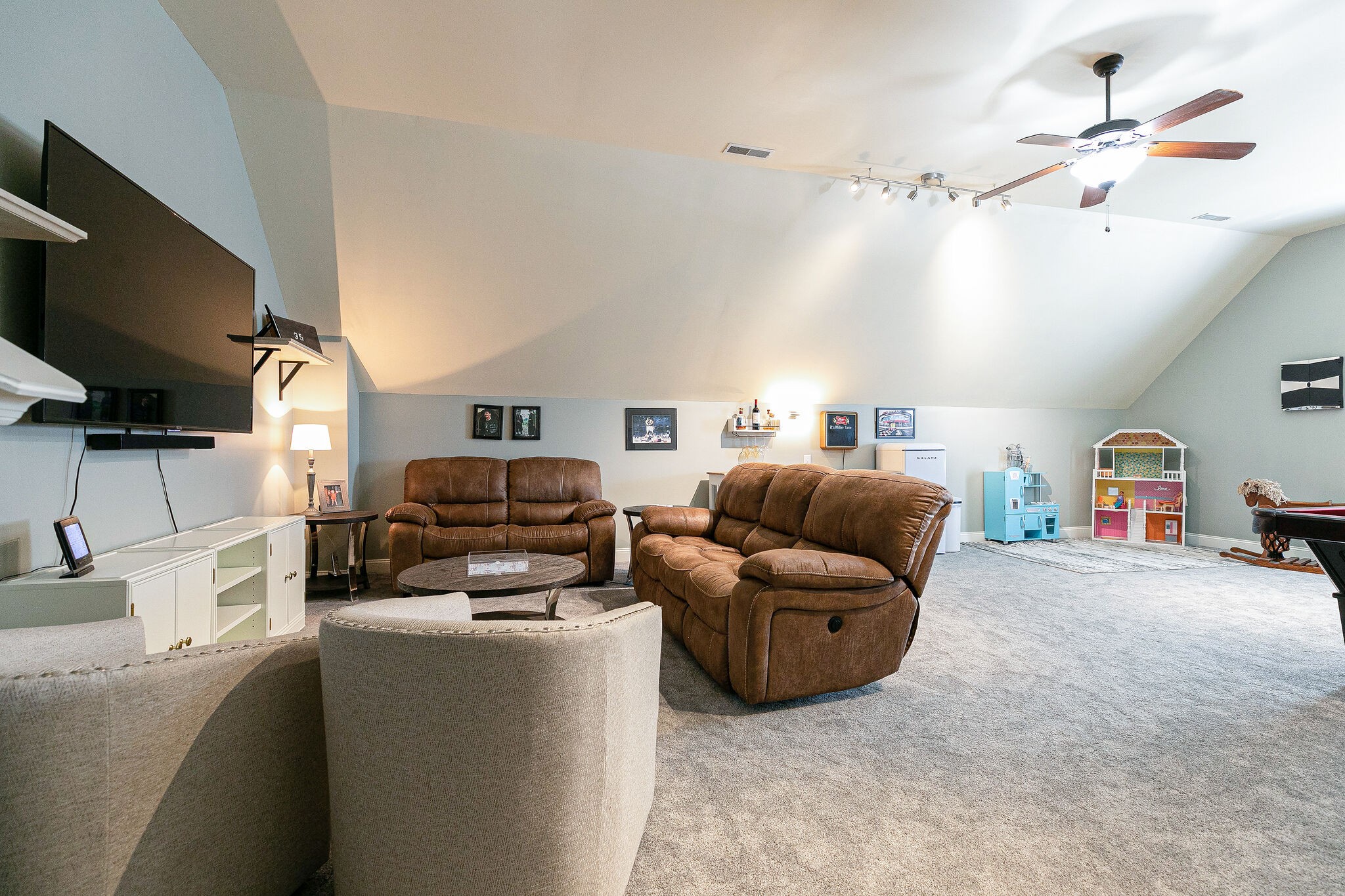 2003 Eylandt Court Spring Hill, TN 37174 - Photo 28 of 33 a living room with furniture and a flat screen tv