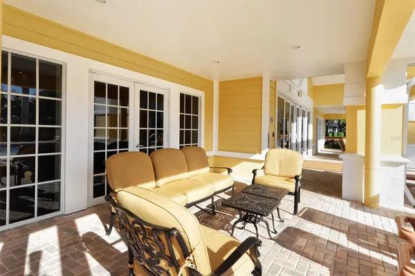 a living room with furniture and a window