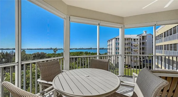 a view of a balcony dining area