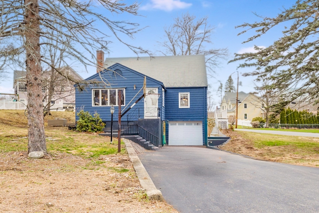 52 Albemarle Avenue, Unit 52 Lexington, MA 02420 - Photo 1 of 23 a house with a outdoor space