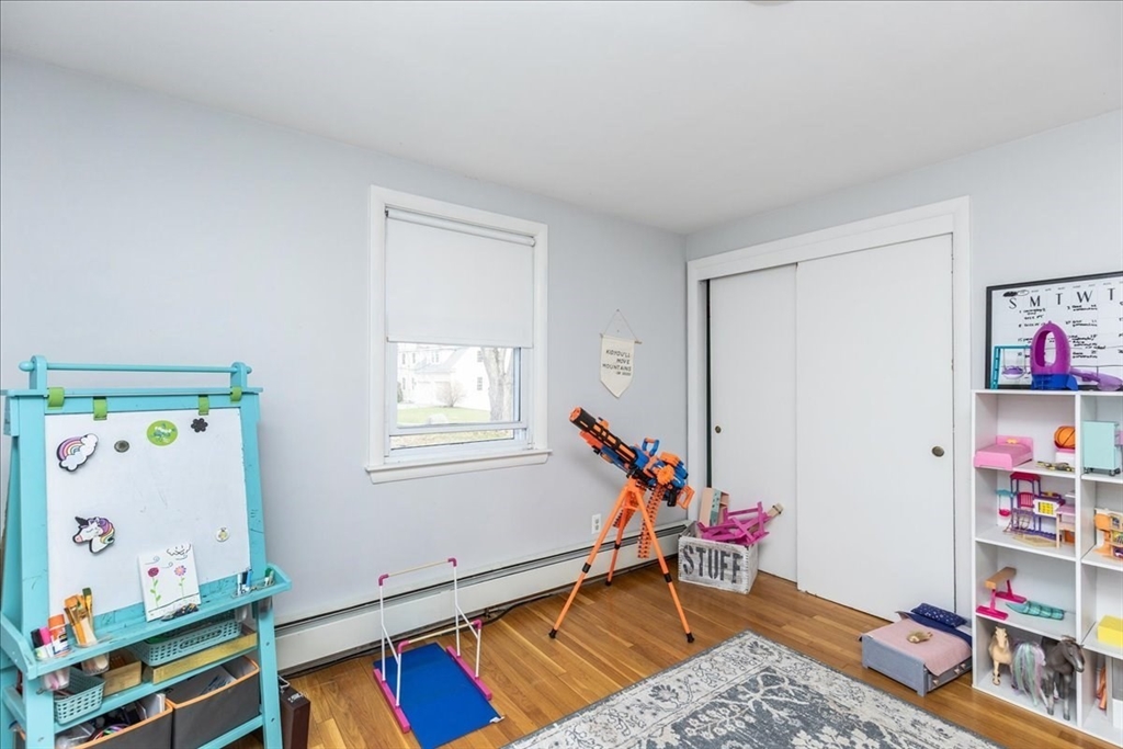 52 Albemarle Avenue, Unit 52 Lexington, MA 02420 - Photo 13 of 23 a room with furniture and toys