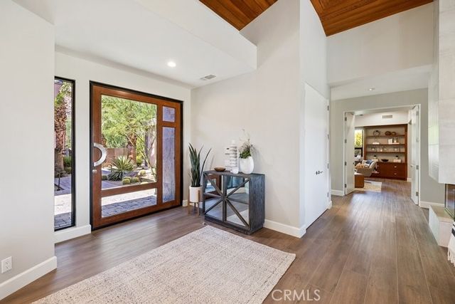 a view of a room with furniture and a gate