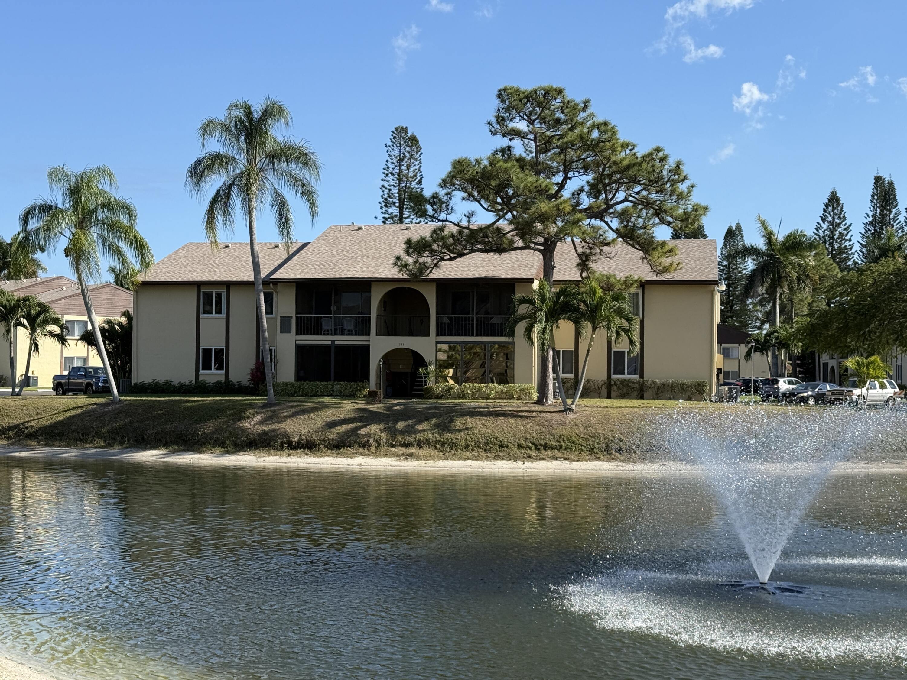 338 Pine Ridge Circle, Unit B2 Greenacres, FL 33463 - Photo 1 of 55 Front