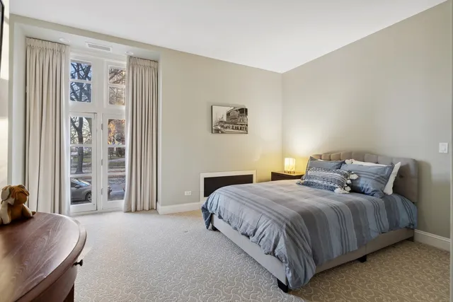 a bathroom with a sink a bathtub a shower and a mirror