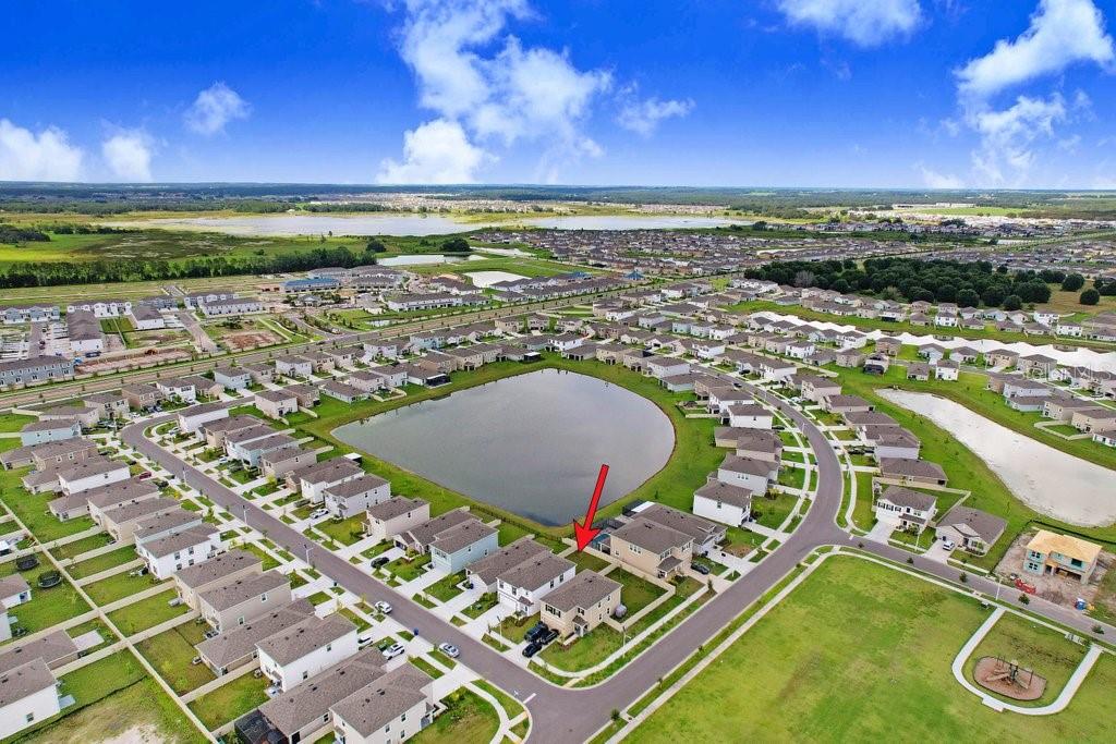 9319 Forge Breeze Loop Wesley Chapel, FL 33545 - Photo 5 of 45 an aerial view of tennis court