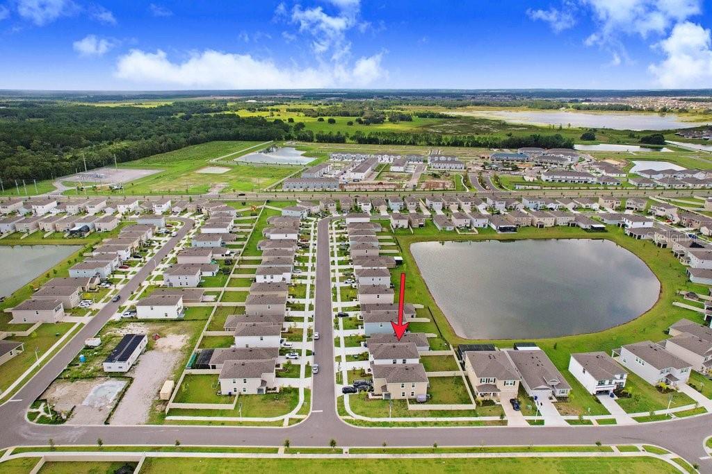 9319 Forge Breeze Loop Wesley Chapel, FL 33545 - Photo 6 of 45 a view of a balcony with swimming pool and outdoor space