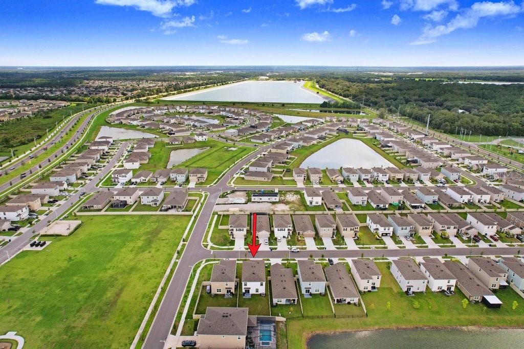 9319 Forge Breeze Loop Wesley Chapel, FL 33545 - Photo 7 of 45 a view of a city with tall buildings