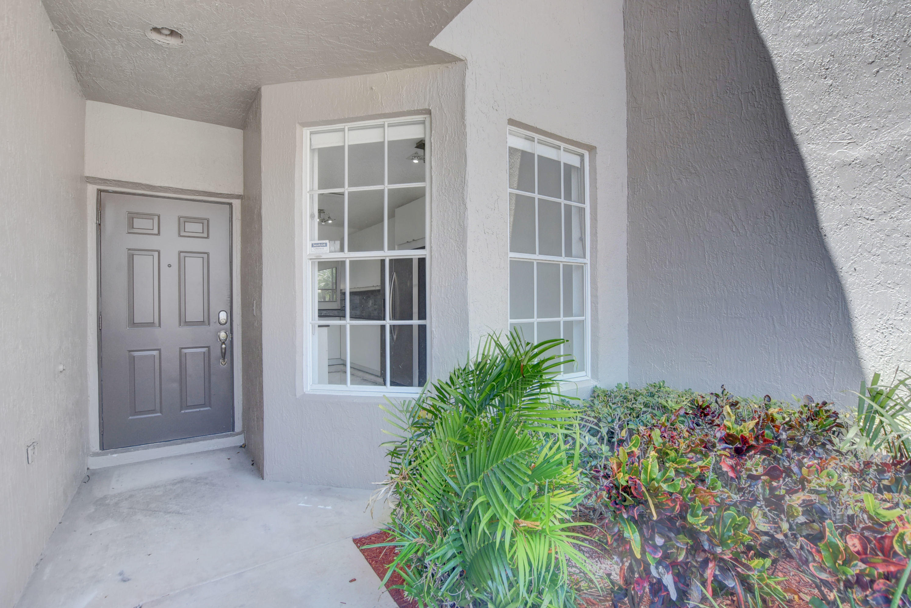 20931 Vía Azalea, Unit 2 Boca Raton, FL 33428 - Photo 2 of 28 Front Entry