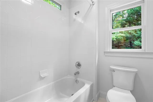 a view of a livingroom with furniture and storage