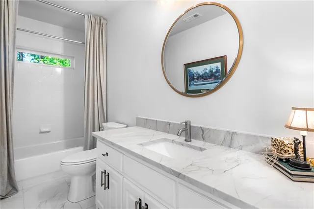 a view of a balcony with chairs