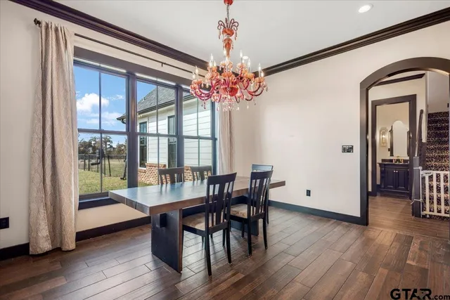 a kitchen with cabinets and window