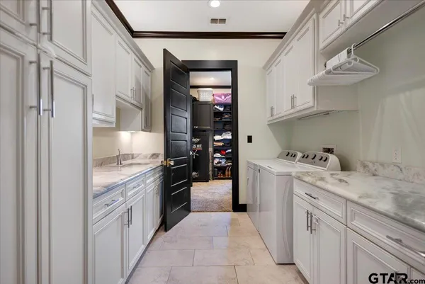 a bathroom with a tub and shower