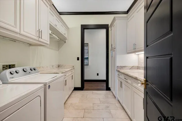 a bathroom with a tub and a sink