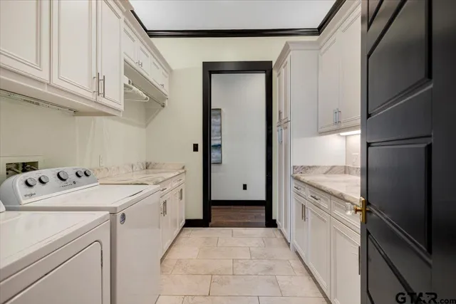 a bathroom with a tub and a sink