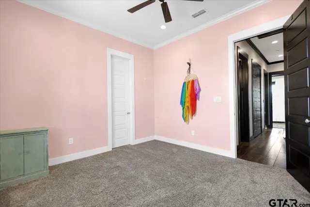 a spacious bathroom with a granite countertop sink and a mirror