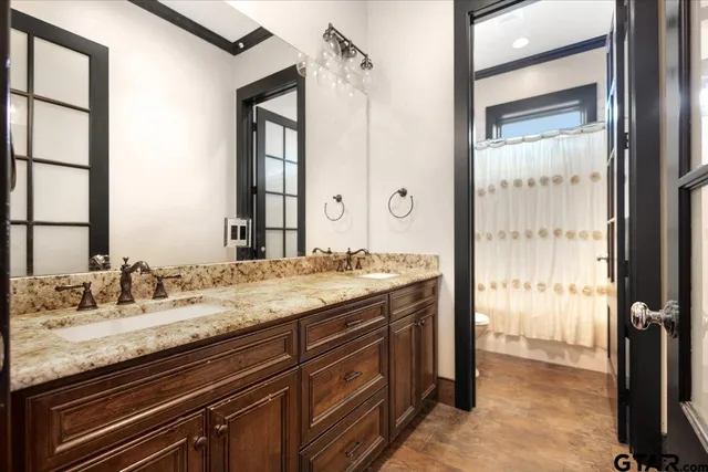 a bathroom with a sink and a toilet