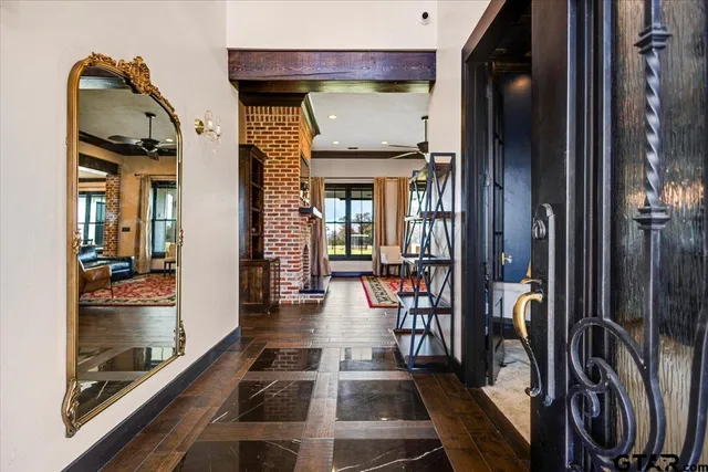 a view of a livingroom with furniture and window