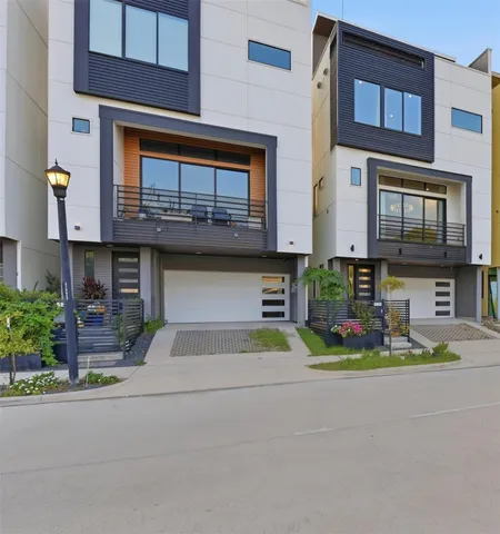 a front view of a house with a garage