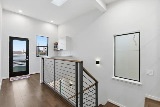 a kitchen with appliances cabinets and a sink