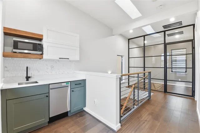 a view of a room that has a window in it