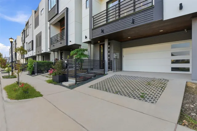 a view of a street with sitting area