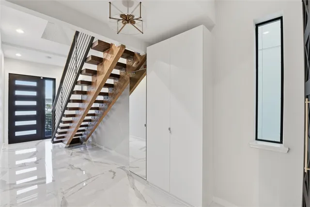 a view of an entryway with staircase