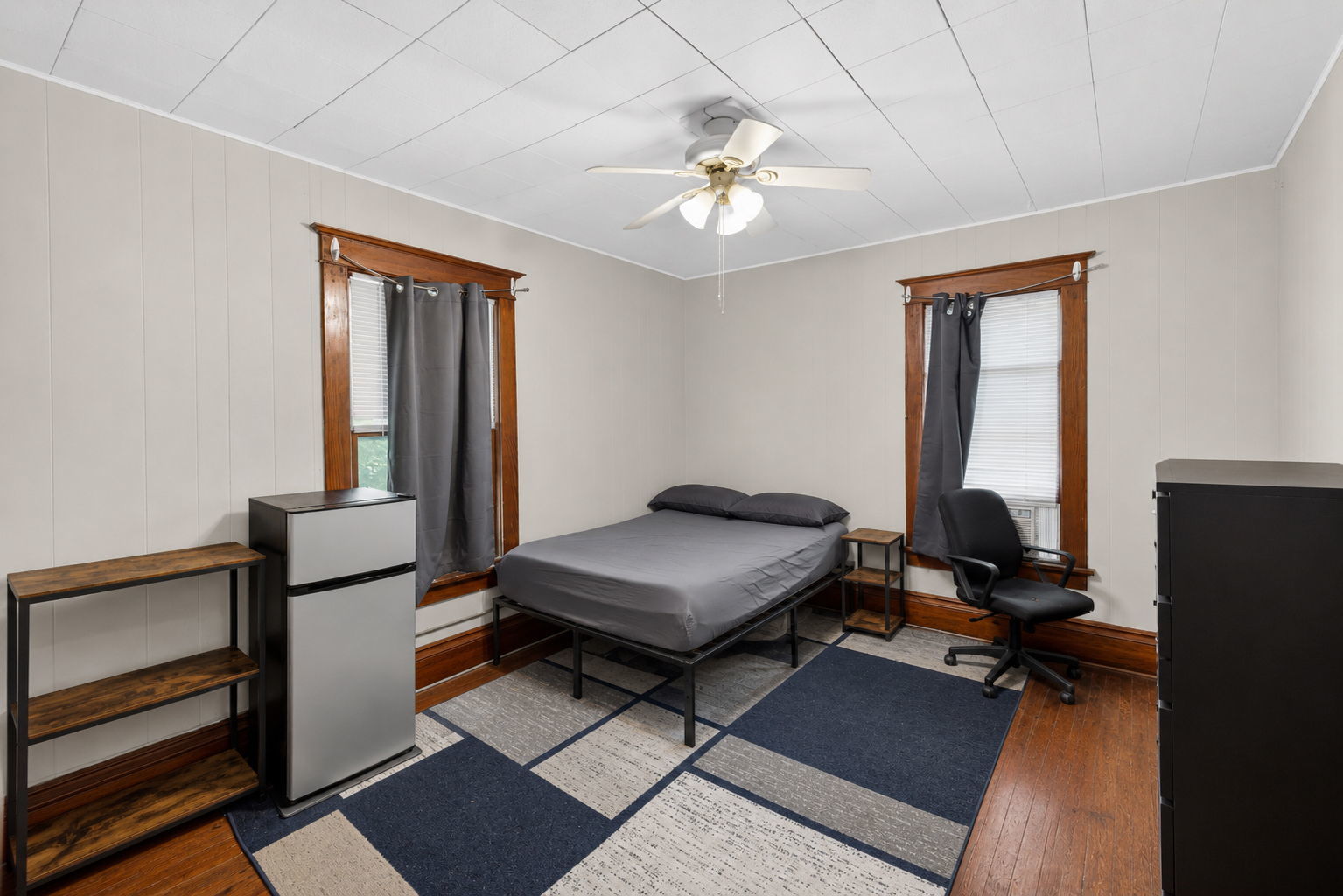 226 West Locust Street DeKalb, IL 60115 - Photo 18 of 40 a room with gym equipment and a window