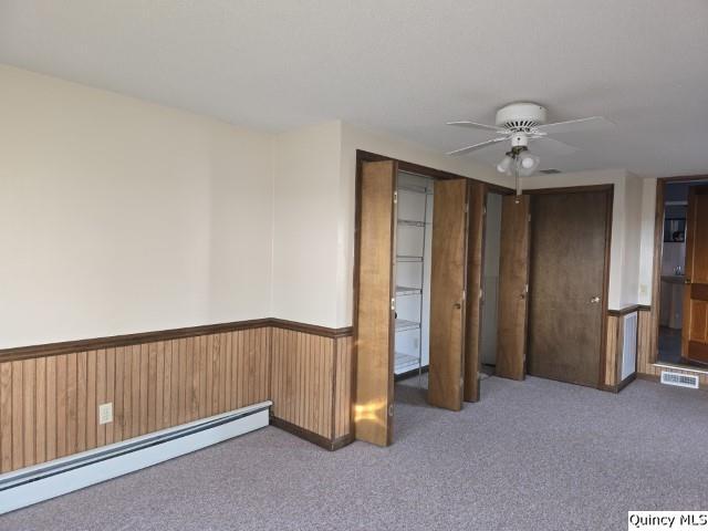 825 Augusta Road Carthage, IL 62321 - Photo 22 of 27 a view of an empty room with a fireplace