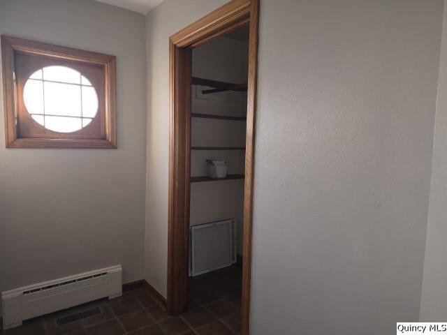 825 Augusta Road Carthage, IL 62321 - Photo 3 of 27 an empty room with windows and closet