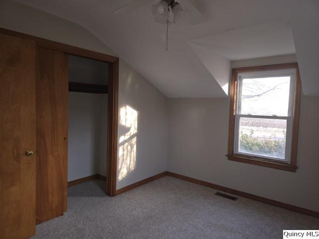 825 Augusta Road Carthage, IL 62321 - Photo 9 of 27 an empty room with windows