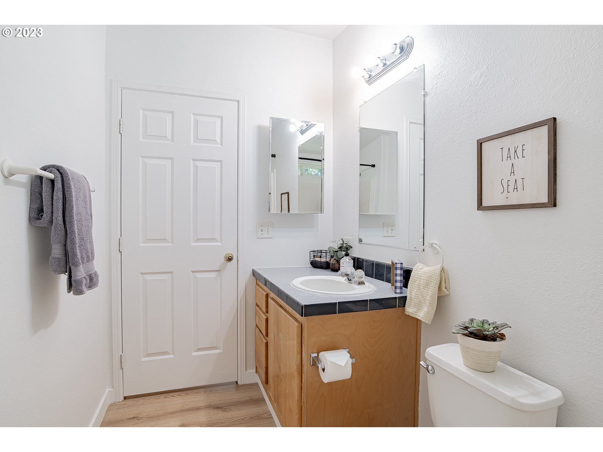21 Nash Road White Salmon, WA 98672 - Photo 22 of 46 a bathroom with a sink a mirror and shower