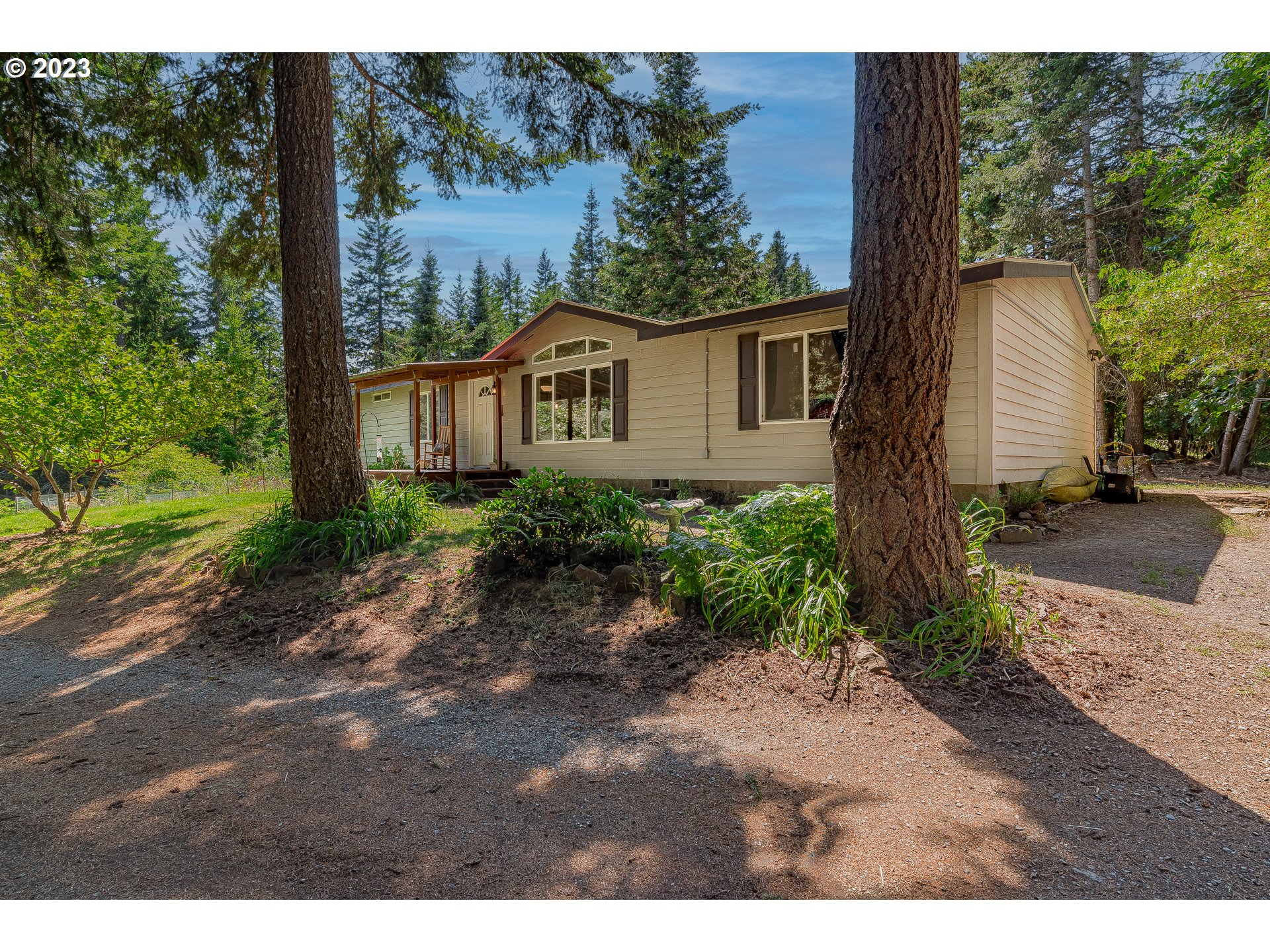21 Nash Road White Salmon, WA 98672 - Photo 38 of 46 a view of a front of house with a yard