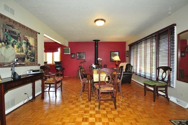 4N350 Walter Road Addison, IL 60101 - Photo 3 of 25 a view of a dining room with furniture window and wooden floor