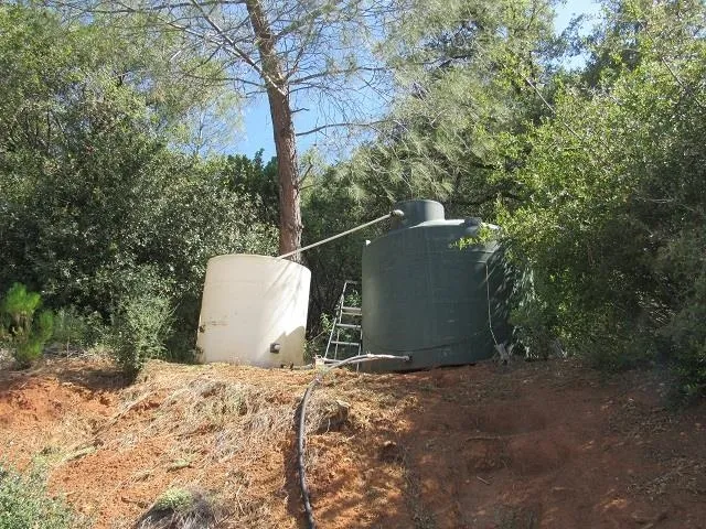 a view of a backyard of the house