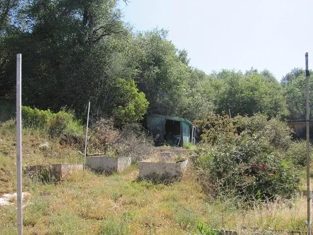 a aerial view of a house with a yard