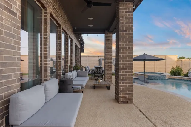 a lobby with furniture and window