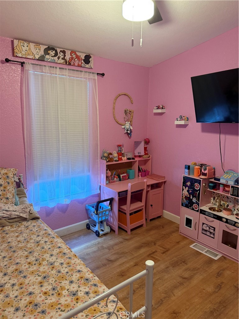 12700 Elliott, Unit 98 El Monte, CA 91732 - Photo 27 of 43 a bed room with a bed and a television