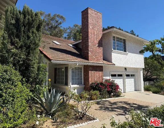 a front view of a house with a porch
