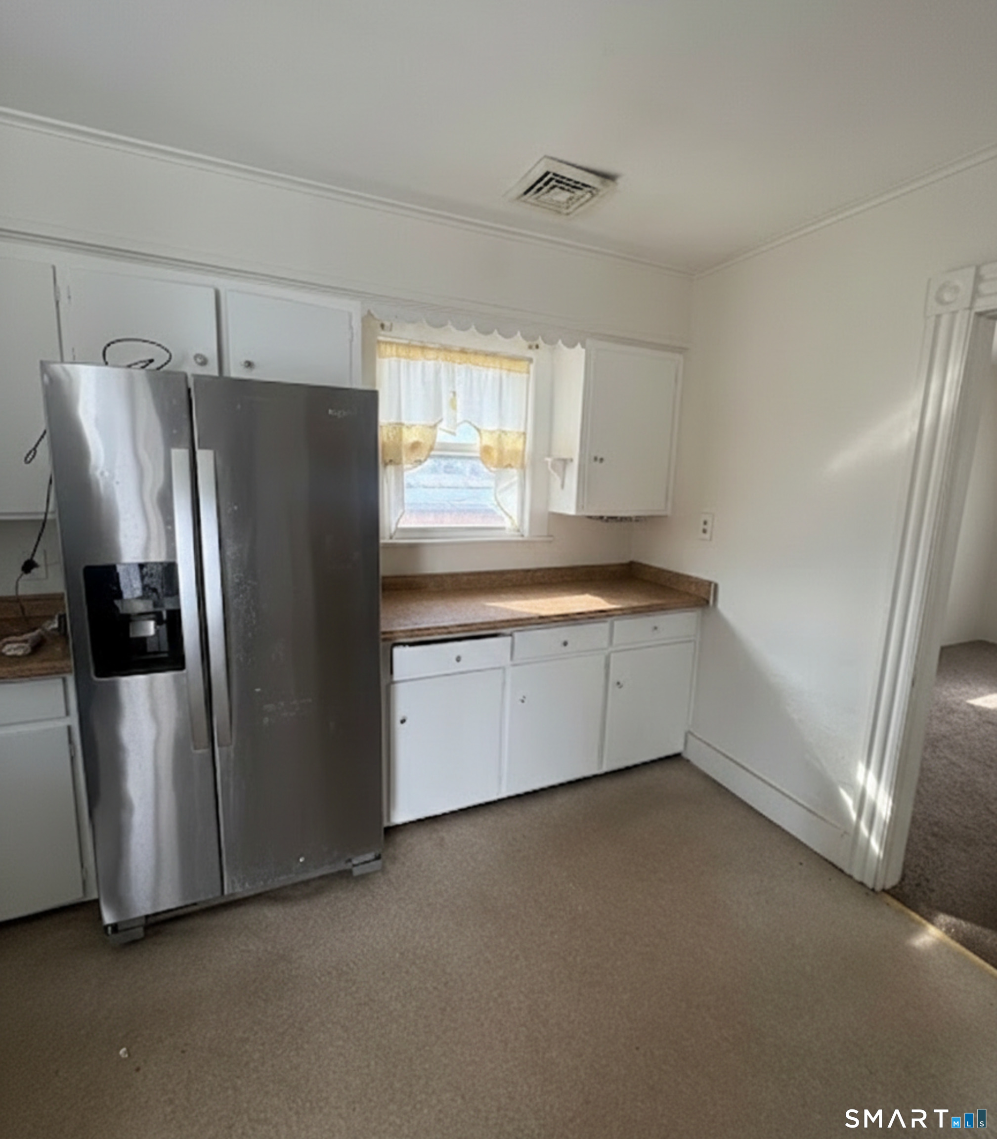 1901 Dixwell Avenue Hamden, CT 06514 - Photo 2 of 10 a kitchen with stainless steel appliances a refrigerator a sink a stove and cabinets