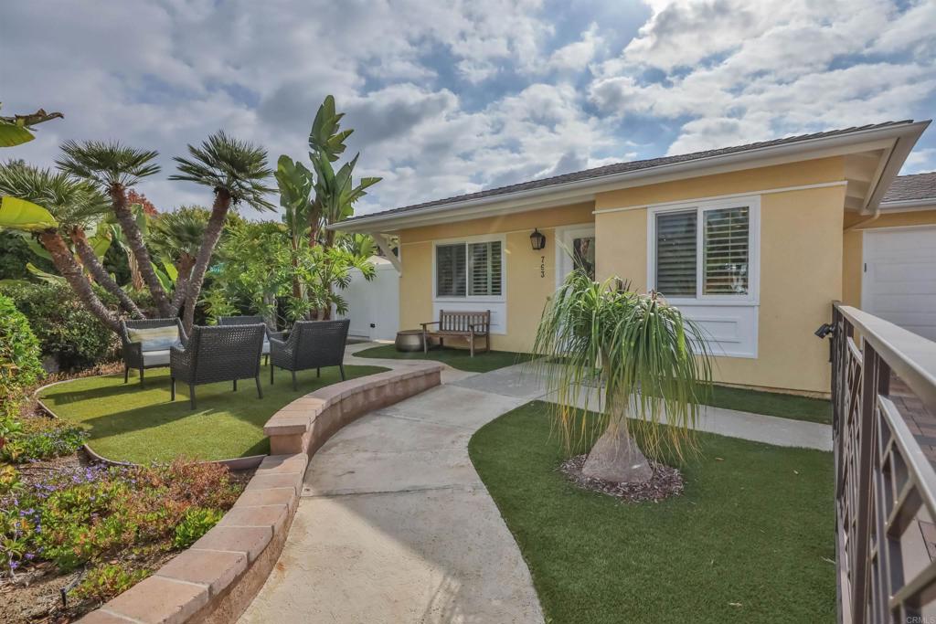 763 Snapdragon Street Encinitas, CA 92024 - Photo 1 of 1 a front view of a house with garden